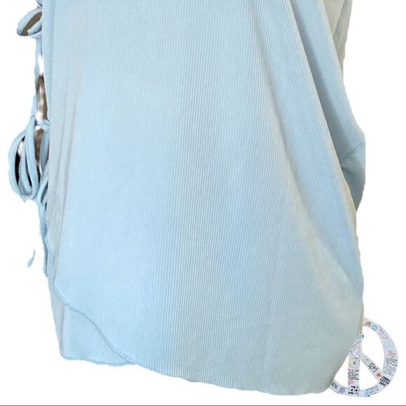 $ 5 add on item $ sky blue faux 3 tie wrap top with ruffled straps. - Picture 3 of 11